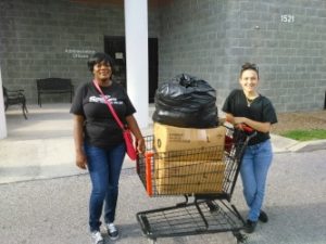 thumbnail_Patrice Kemp(l) and Gloria Lugo(r)_donating old items.jpg.png